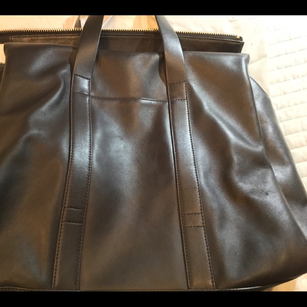 Aritzia’s Six Eleven black leather McDuffle - Picture 9 of 14
